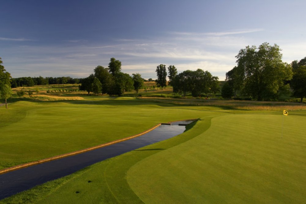 Long Par 3 with a river on The Grove golf course