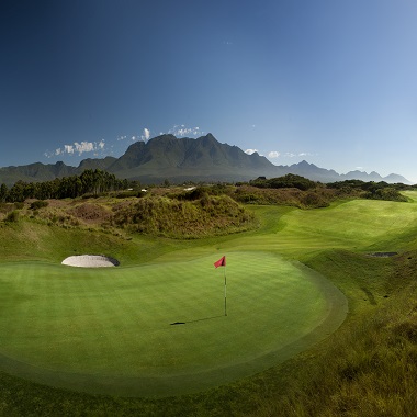 Large green and mountain on a course in South Africa