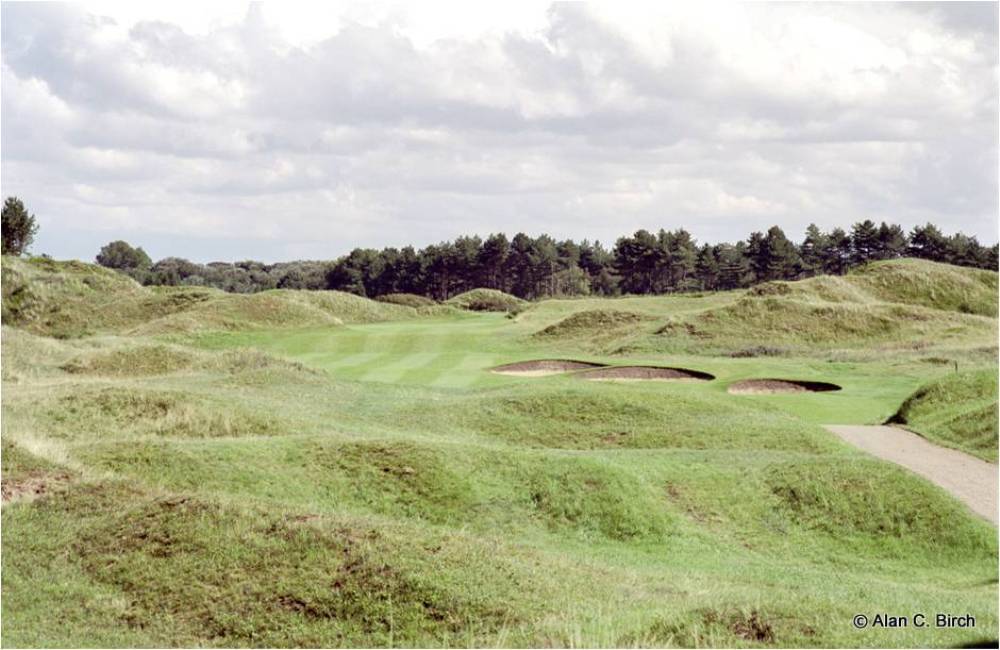 Hole surrounded by dunes on the Formby golf course