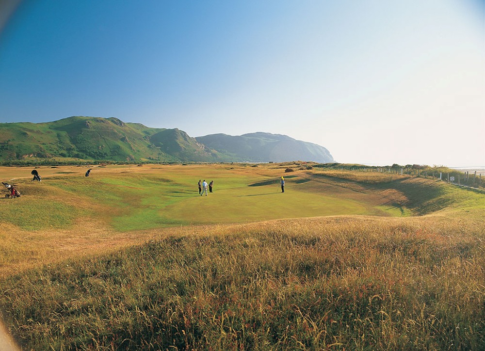 Golfers playing on the Conwy golf course