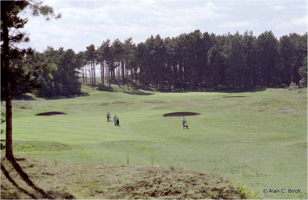 Golfers playing on the Formby golf course