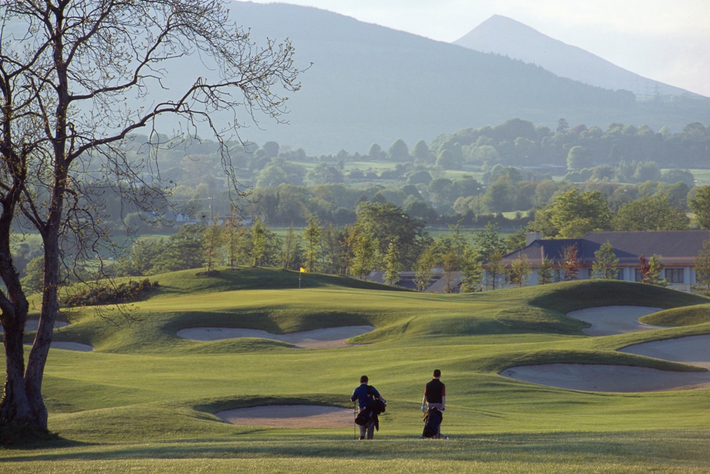 Contryside behind bunkers at Druids Glen Golf Course 