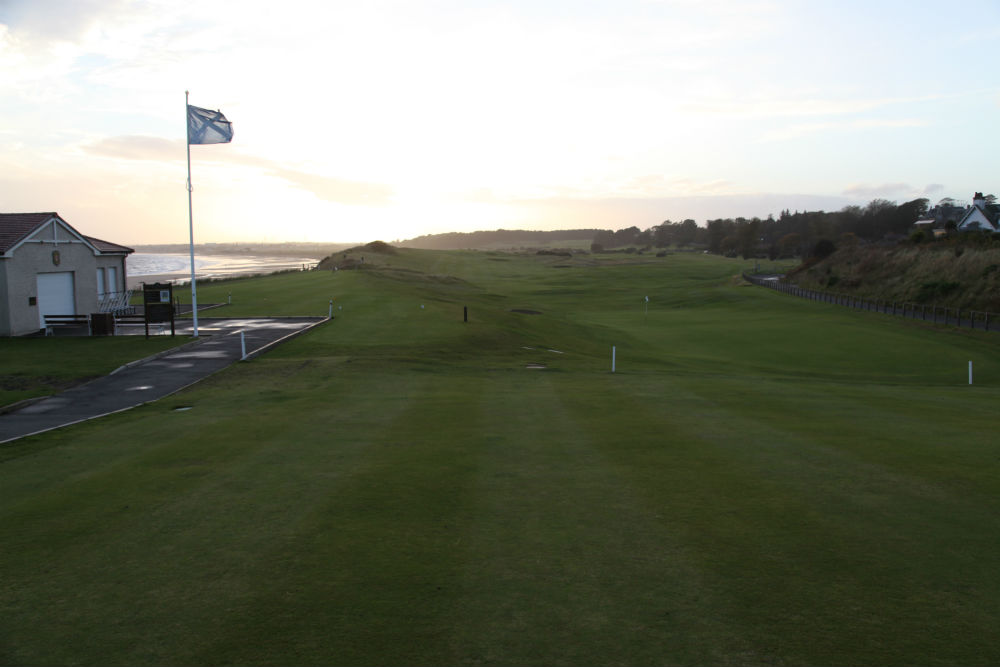 First tee and 18th green at Lundin Links