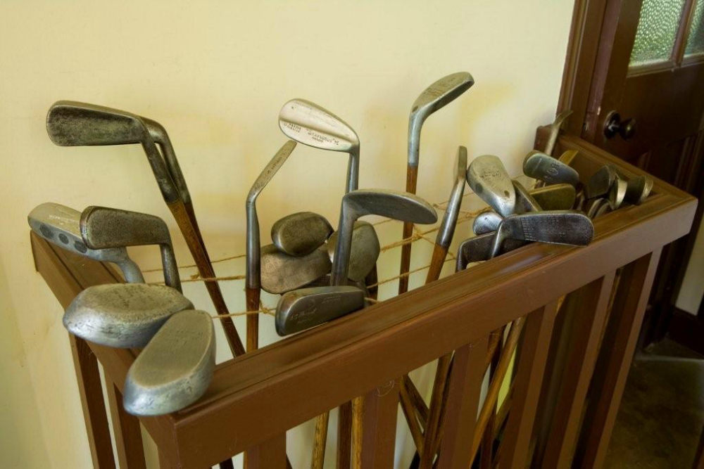 Various types of golf clubs with wooden shafts at kingarrock