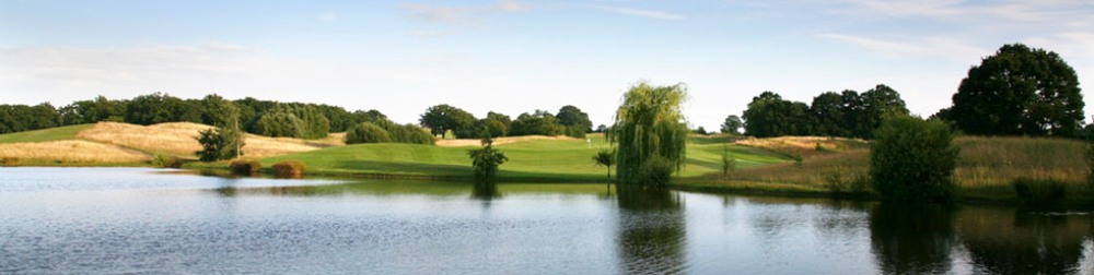 Lake and hole on the Chart Hills golf course