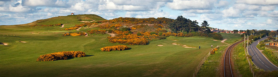 Railway, holes and gorse on the Sheringham golf course