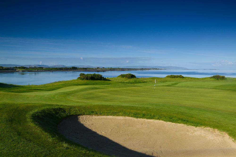 Green, bunker and sea on the Galway Bay Golf Course