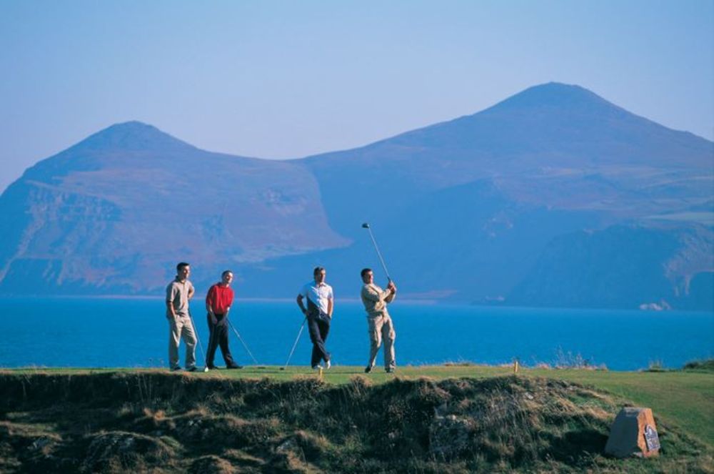 Golfers playing on Nefyn and District golf course