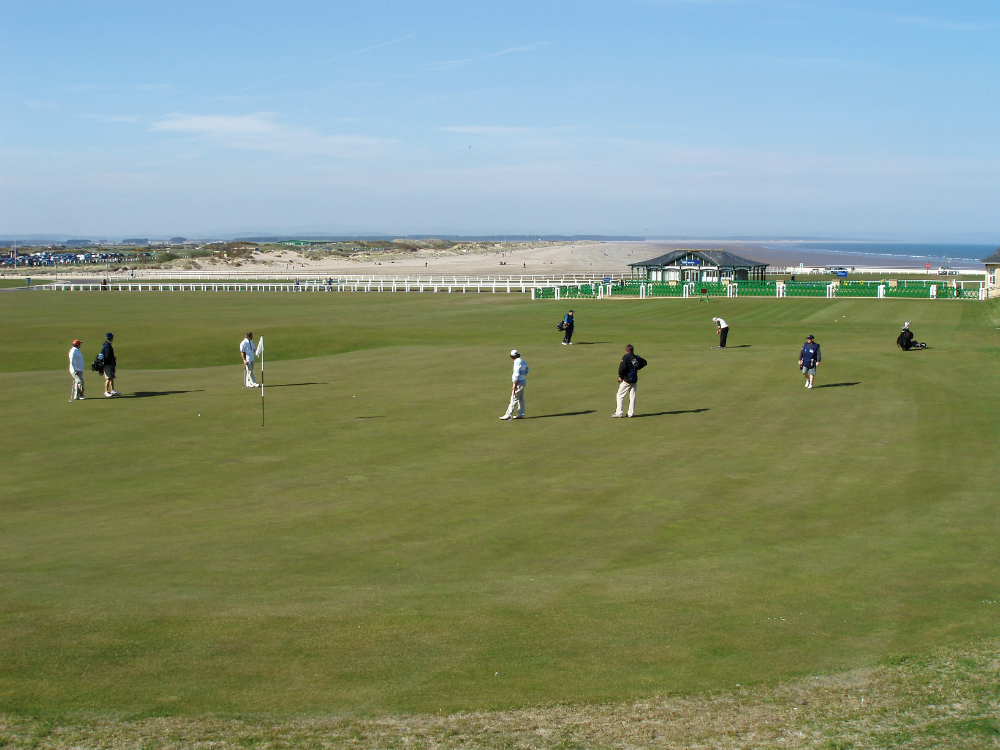 Golfers on the 18th green of the Old Course at St Andrews