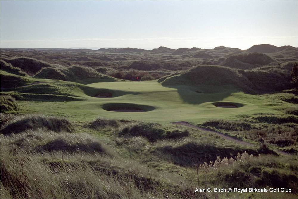 Green surrounded by dunes and bunkers on the Royal Birkdale golf course