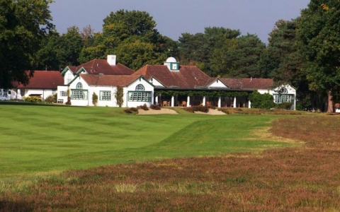 Club House and 18th hole at Woking