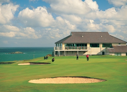 Golfers playing on the Bull Bay golf course