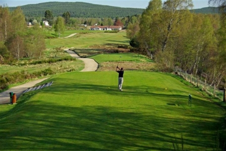 Golfer playing the 18th hole at Boat of Garten