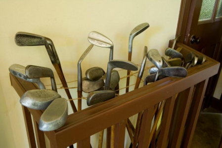Various types of golf clubs with wooden shafts at kingarrock