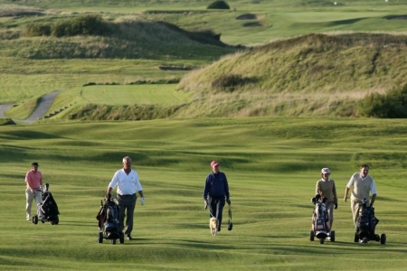 Golfers playing on the Championship golf course at Trevose golf club