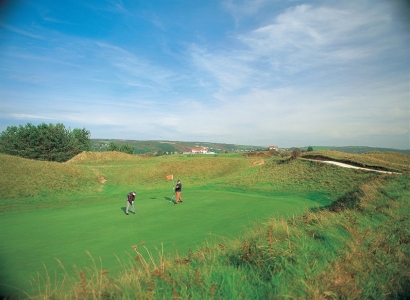 Golfers putting on the Ashburnham golf course