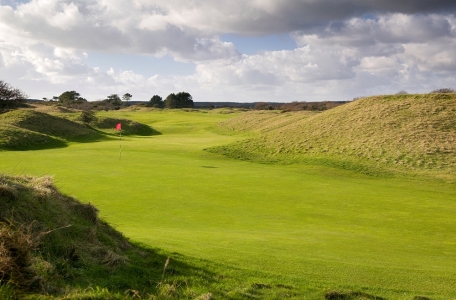 Green surrounded by dunes at Ashburnham