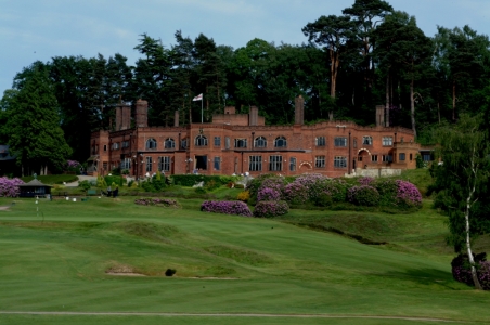 Hole and clubhouse at the St George's Hill golf course