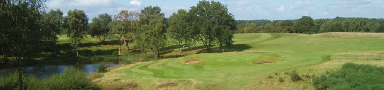 Green and lake at the Delamere Forest golf course