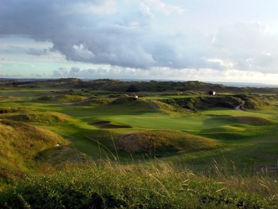 Large green and dunes on the East course at Saunton golf club