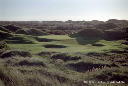 Green surrounded by dunes and bunkers on the Royal Birkdale golf course
