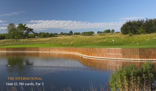 Green and lake on the 12th hole at the International golf course at London golf club