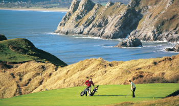 Golfeurs sur le parcours de Pennard à Swansea