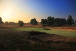 Fairway bunker and green at Hankley Common golf course