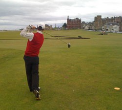 Image of gentleman playing golf at St Andrews Old Course
